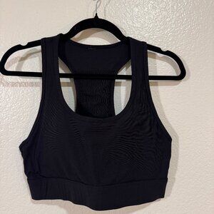 Fabletics On-The-Go Medium Impact Sports Bra | Blac | Size L